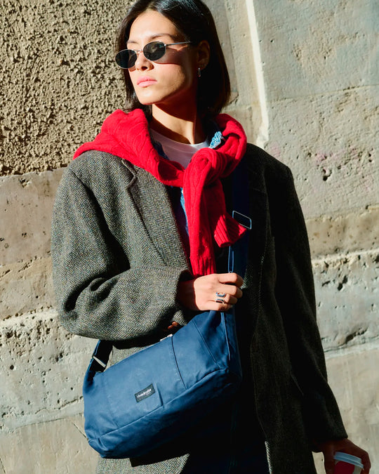 The Mini Charlot is a compact shoulder bag large enough for all your daily essentials. For AW26 the bag is made from a 100% organic cotton canvas fabric with a water resistant coating