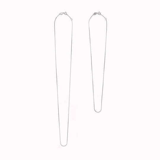 The Box Chain necklace from Anni Lu is a delicate chain necklace with a tight, square-link structure. 