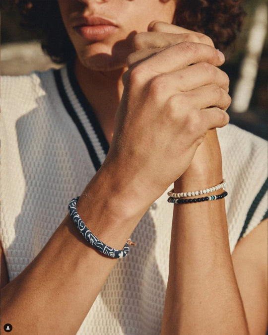 Mikia's handmade Bead bracelet combines black jet with an irregular mix of colour natural stones and shell to create a distinctive beaded necklace with rich variations in colour and texture.