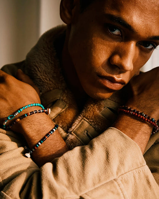 Mikia's handmade Bead bracelet combines black jet with an irregular mix of colour natural stones and shell to create a distinctive beaded necklace with rich variations in colour and texture.