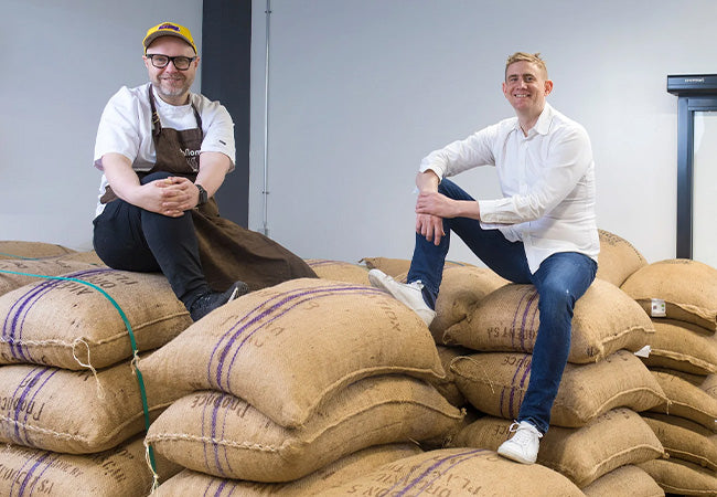 Omnom Iceland Creators on sack of cocoa beans