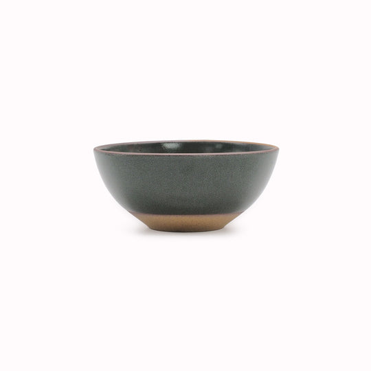 The Chips Inc. Bricks Bowl in green is a testament to functional design and aesthetic appeal. Crafted with a focus on usability and comfort, the bowl features a silhouette that is timeless and easy to hold.