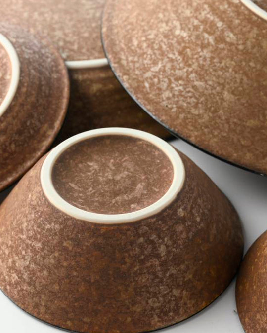 Rough textured Donburi bowl with matt glaze in a coppery brown shade that catches the light to reveal a golden shimmer. Suitable for serving rice, or any number of side dishes.