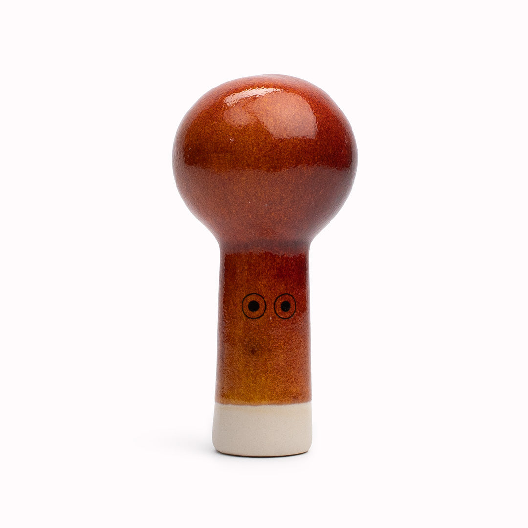 Meet Oni! Oni is a balloon headed, hand glazed ceramic figurine created as a close relative of the classic Arhoj Ghost