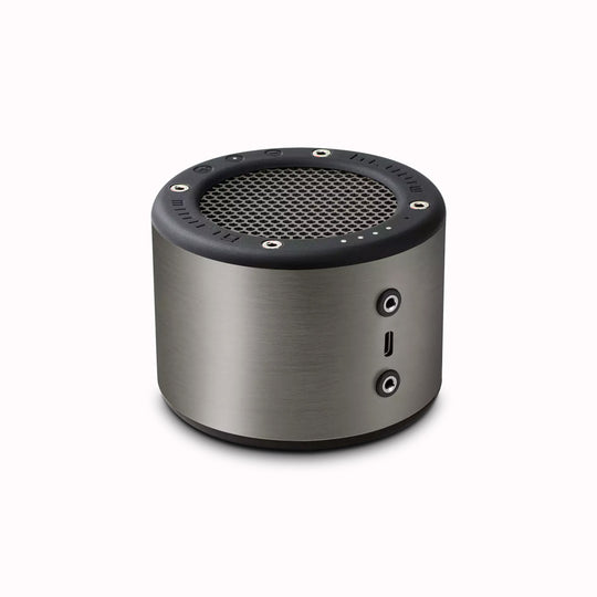 The Minirig Mini 4 in Brushed Ion is a portable Bluetooth speaker that represents the latest innovation in audio technology. Crafted in Bristol, UK, this speaker is the result of over a decade of design evolution, offering a robust anodized aluminium and high-impact ABS construction.