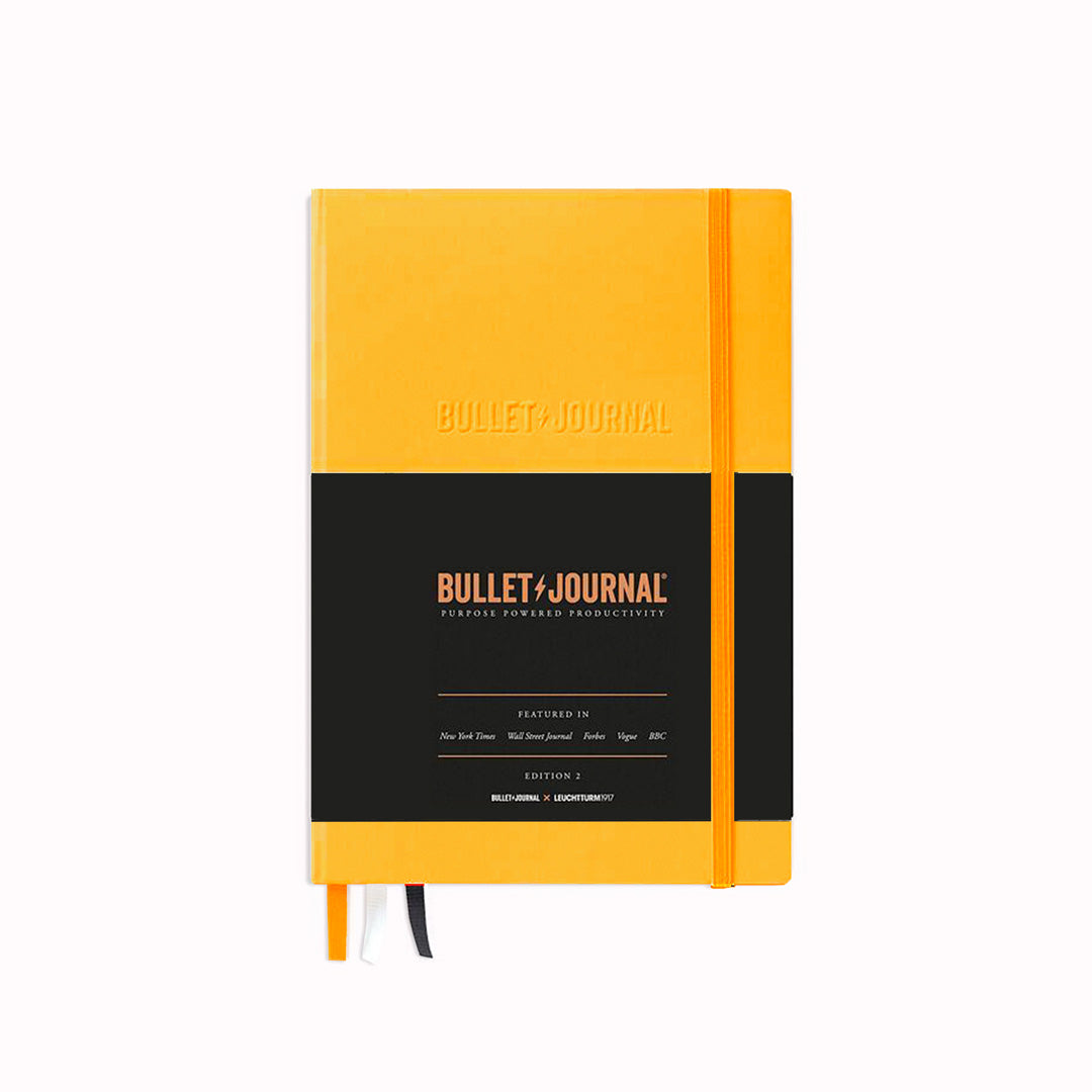 Yellow A5 Bullet Journal Edition 2 from Leuchtturm1917 features a smooth paper surface with very low transparency. Additionally, the journal includes a detachable Bullet Journal pocket guide, index, future log and 206 numbered pages.