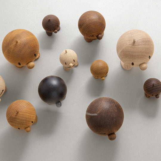 Above Collection - Playfully designed small Hoptimist in oak from the Danish designers Hoptimist. Most smiles are triggered by another smile