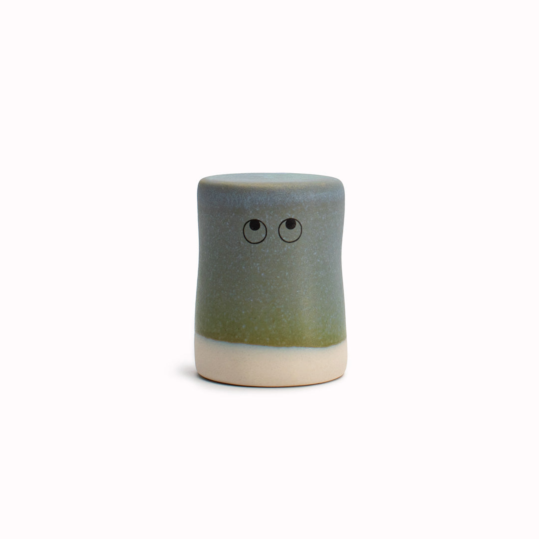 Meet Buto - A hand glazed ceramic figurine created as a close relative of the classic Arhoj Ghost. The Familia, including Buto, is a continuation of the playful decorative object series from Studio Arhoj