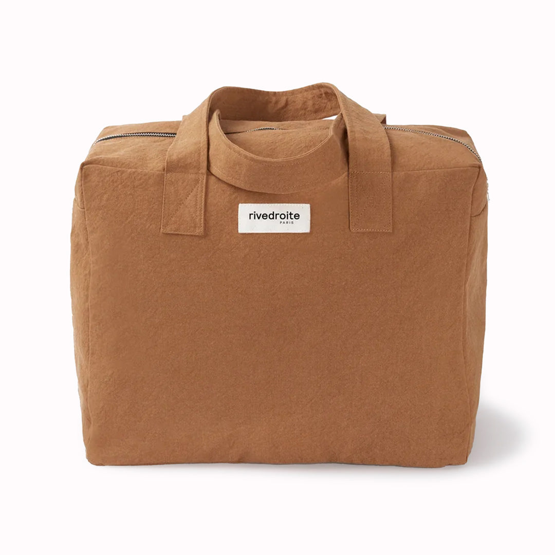 As the name suggests, this Camel coloured Célestins bag from Parisian brand Rive Droite is a chic canvas overnight travel bag with enough room for a night away (or 2 if you pack light!)