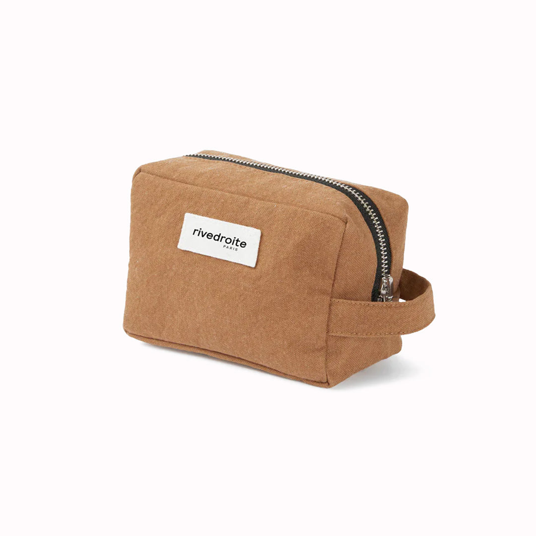 Camel Tournelles bag from Parisian brand Rive Droite is a compact everyday toiletry make up bag made from re-cycled cotton. View from an angle