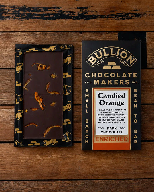 Seville was the first port in Europe to receive cacao from the Americas. Paying homage, this Bean-to-Bar dark chocolate bar from Bullion Chocolate is studded with shards of their prized oranges and infused with a delicious orange taste.
