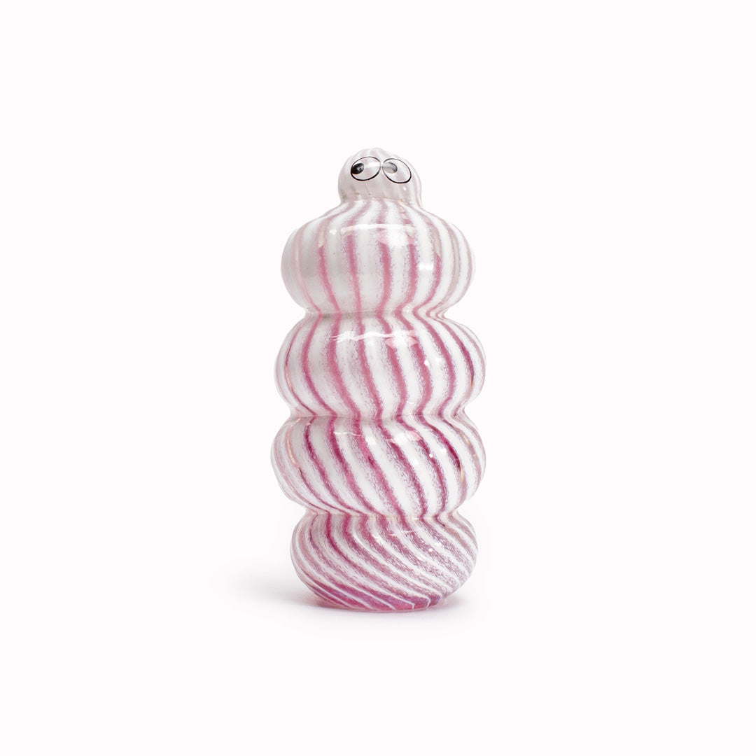 Candy Cane, a brightly coloured nobbly blob is formed by dipping and/or rolling molten (hot!) clear glass into smaller chunks of brightly coloured glass droplets