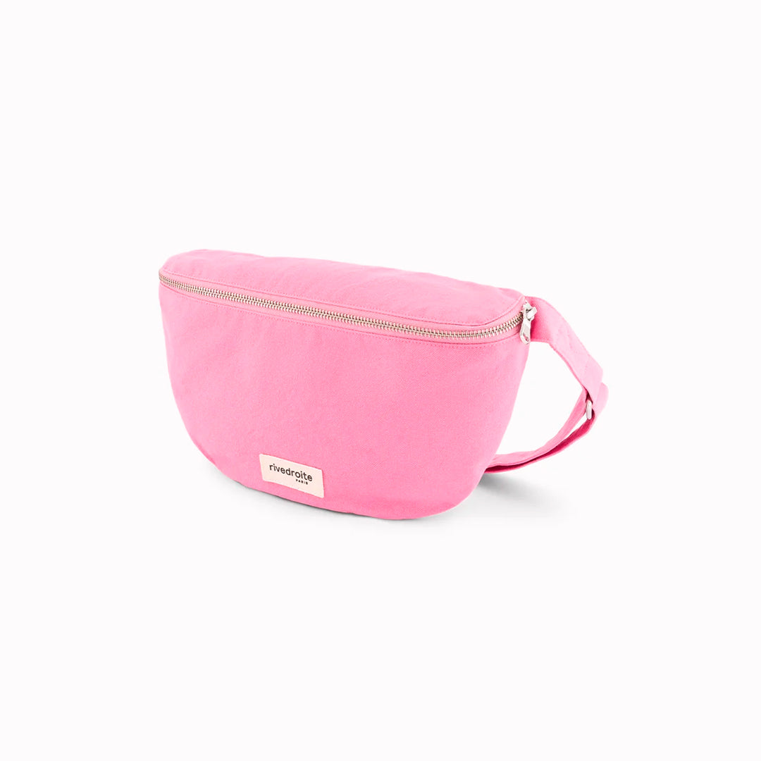 The Custine Belt Bag by Rive Droite Paris is a compact belt bag made from a Candy Pink recycled cotton fabric.