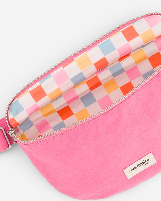 The Custine Belt Bag by Rive Droite Paris is a compact belt bag made from a Candy Pink recycled cotton fabric.