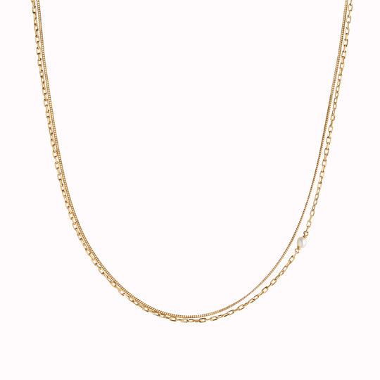 From Maria Black - Crafted from 925 Sterling Silver, this 22K Gold Plated Cantare Necklace features 1 baroque freshwater pearl measuring 4-5 mm in size