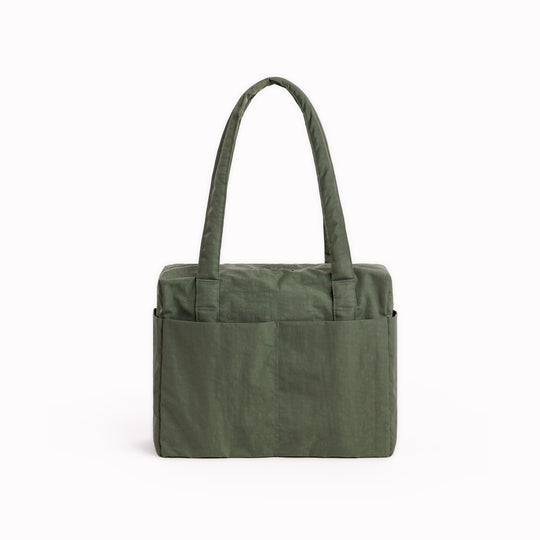 Made from recycled heavyweight nylon in a muted green colourway, it holds its shape without feeling rigid.