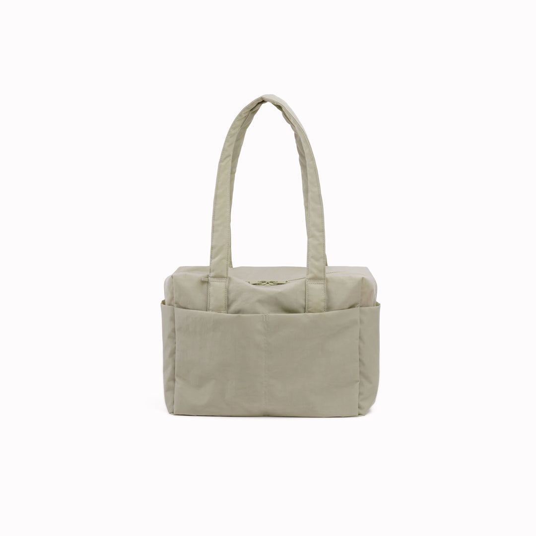 Everyday Cloud Carry-On in Celedon from Baggu, an impeccably crafted travel essential designed for discerning travelers.