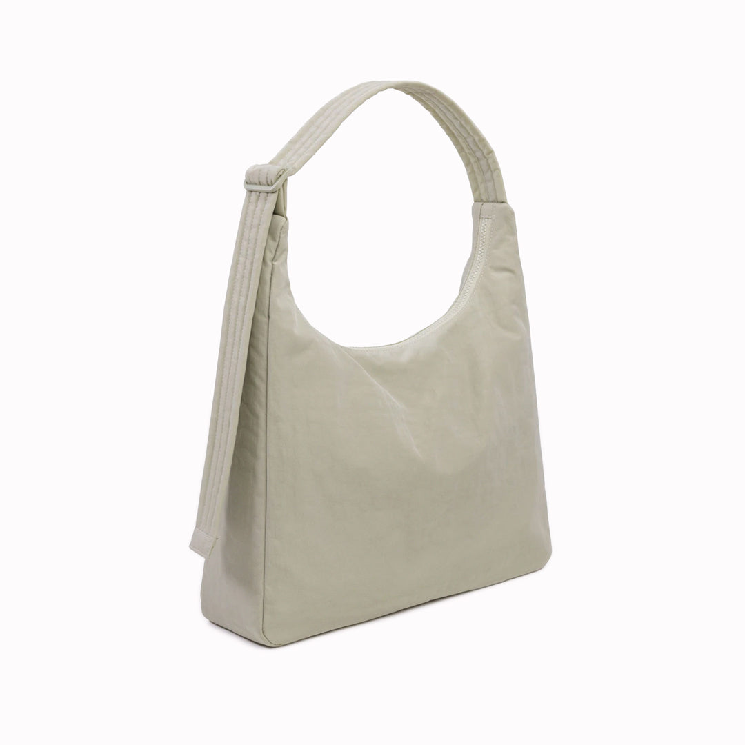 Practical shoulder bag designed for daily use and urban mobility. Crafted from recycled heavyweight nylon with a recycled ripstop lining