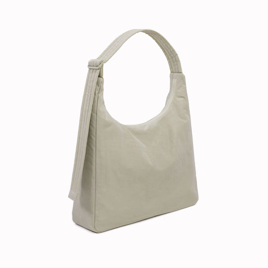 Practical shoulder bag designed for daily use and urban mobility. Crafted from recycled heavyweight nylon with a recycled ripstop lining