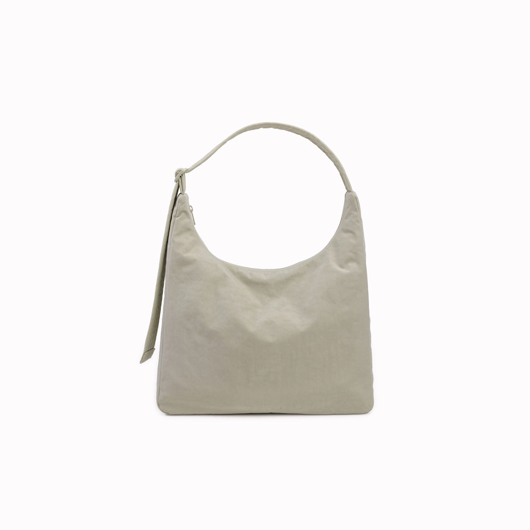 Practical shoulder bag designed for daily use and urban mobility. Crafted from recycled heavyweight nylon with a recycled ripstop lining