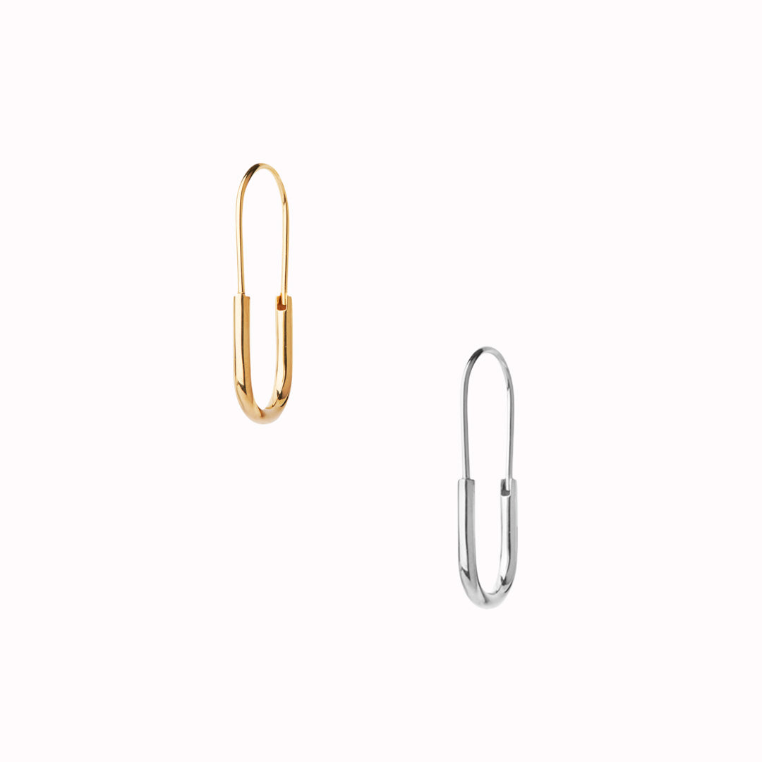 The Mini Chance Earring is made from recycled 925 Sterling Silver with either White Rhodium plating or 22k Gold and measures 26mm x 12mm. 