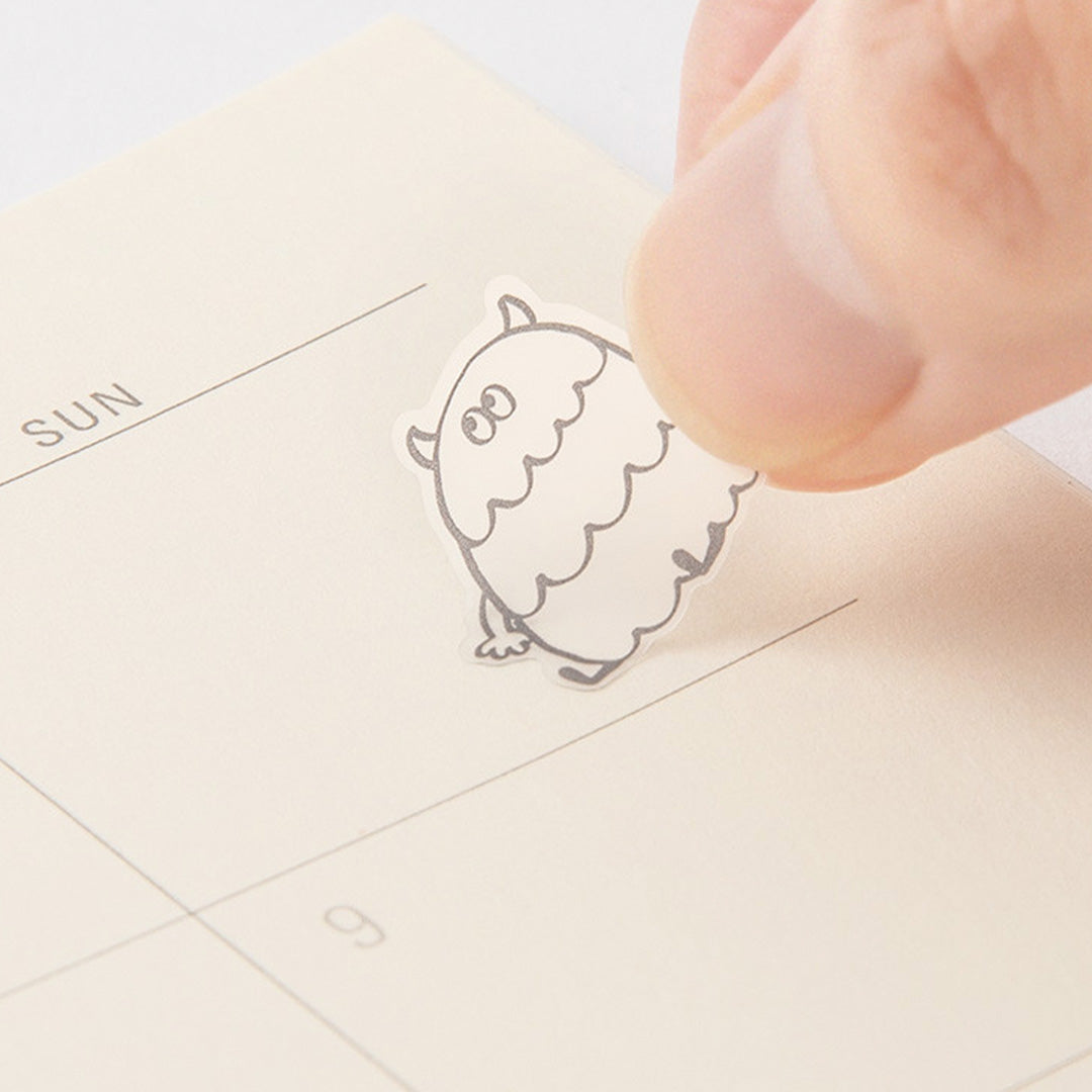 Add some personality to your journalling with Midori's chat monster stickers. The mono coloured hand drawn designs have a low tack sticky adhesive back meaning that they are reusable and are printed on a hardwearing translucent acrylic paper to look like they are printed on the page.