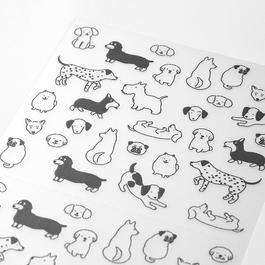 Add some personality to your journalling with Midori's chat dog stickers. The mono coloured hand drawn designs have a low tack sticky adhesive back meaning that they are reusable and are printed on a hardwearing translucent acrylic paper to look like they are printed on the page.