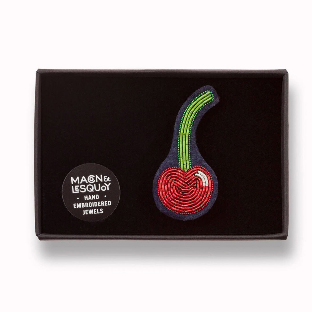 Cherry Chérie is a hand embroidered decorative brooch from Macon et Lesquoy - a cheeky cherry for your chérie. Personalise your favourite garments to define your individual style. In Box