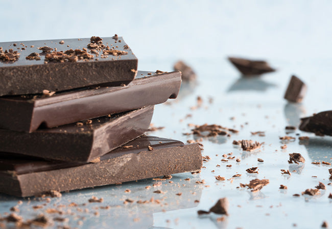 different vegan chocolate bars on table