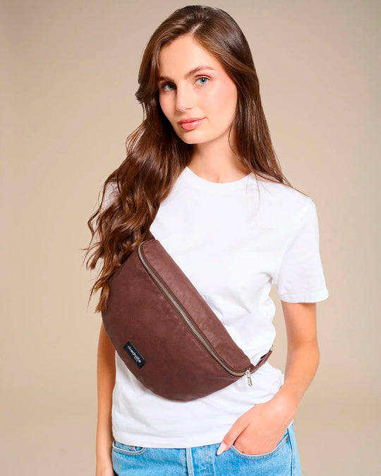 The Custine Belt Bag with an AW26 update - same original size and shape reworked with a waxed finish to give the new season fabric a richer colour and a worn in appearance over time.