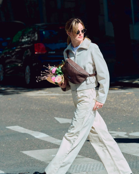 The Custine Belt Bag with an AW26 update - same original size and shape reworked with a waxed finish to give the new season fabric a richer colour and a worn in appearance over time.