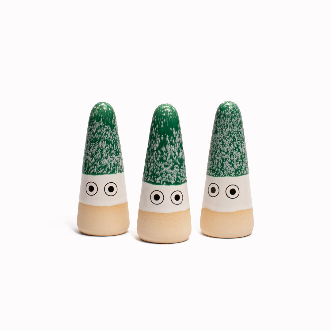 The Green Mini Nisse by Studio Arhoj are smaller, cuter versions of the iconic ceramic Arhoj Ghost figurine, in traditional Christmas colours.