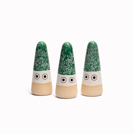 The Green Mini Nisse by Studio Arhoj are smaller, cuter versions of the iconic ceramic Arhoj Ghost figurine, in traditional Christmas colours.