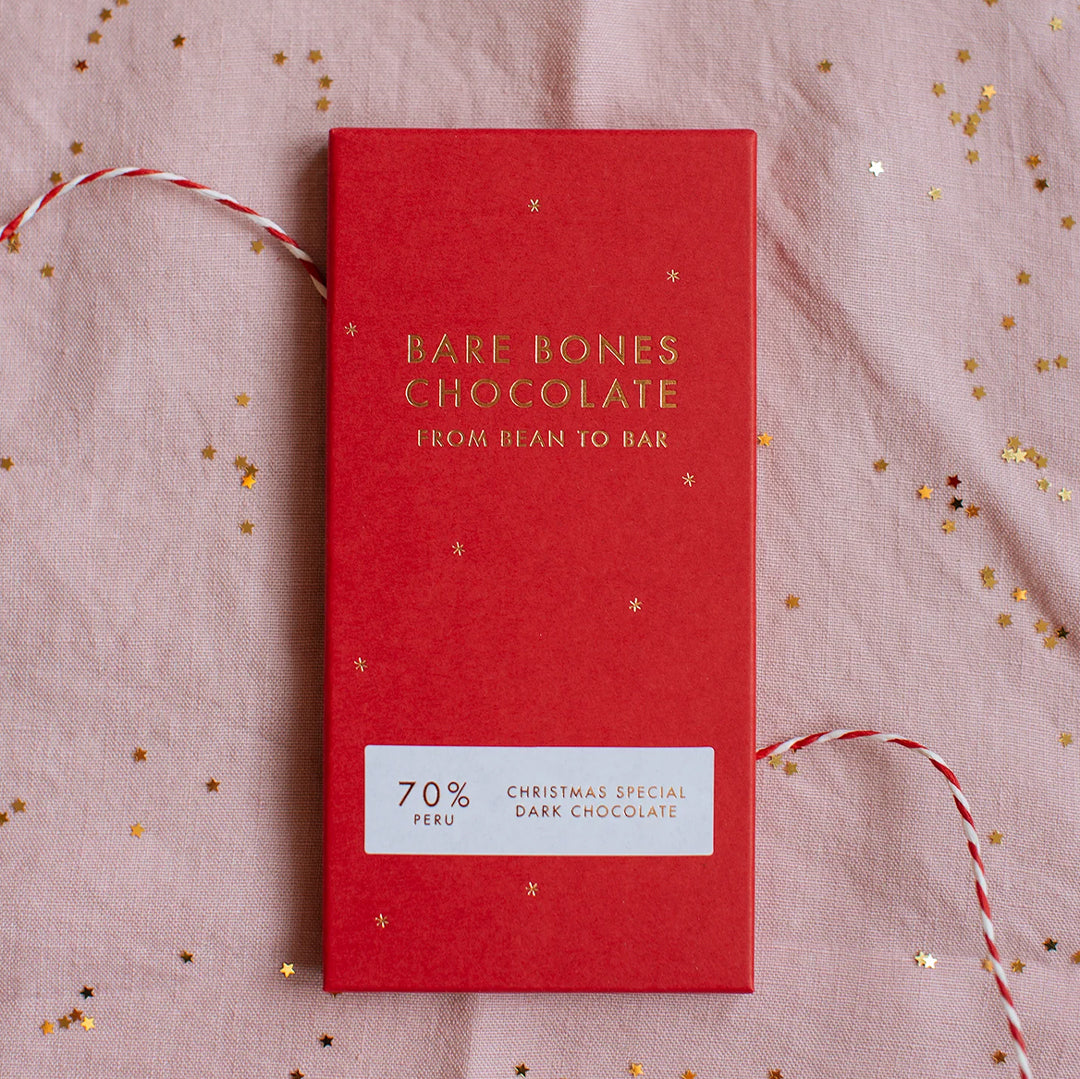 The 2025 Christmas Special chocolate bar by Bare Bones is a single-origin Peru 70% dark chocolate with appropriately festive taste notes of mince pies and cinnamon. close up
