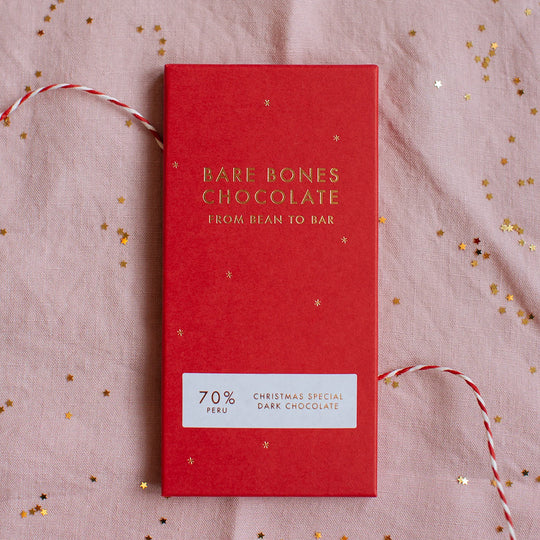The 2025 Christmas Special chocolate bar by Bare Bones is a single-origin Peru 70% dark chocolate with appropriately festive taste notes of mince pies and cinnamon. close up
