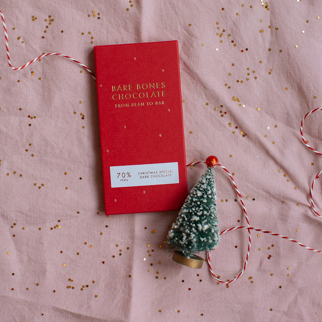 The 2025 Christmas Special chocolate bar by Bare Bones is a single-origin Peru 70% dark chocolate with appropriately festive taste notes of mince pies and cinnamon. with tree