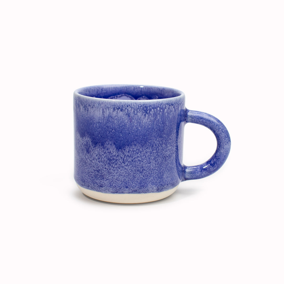 Loch Ness, a royal blue heavy glazed, Japanese inspired ceramic mug from Studio Arhoj. The Chug Mug features their trademark thick, hand poured coloured glaze which means that each mug is unique.