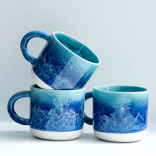 Mariana is a blue hued heavy glazed, Japanese inspired ceramic mug from Studio Arhoj. The Chug Mug features their trademark thick, hand poured coloured glaze which means that each mug is unique.