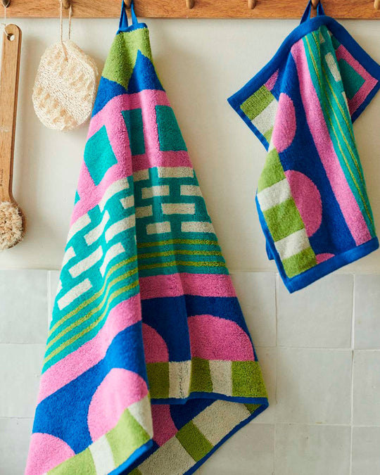 The Circus Collection of Towels from Donna Wilson is a vibrant colour filled graphic illustration inspired by the magic of the big top.