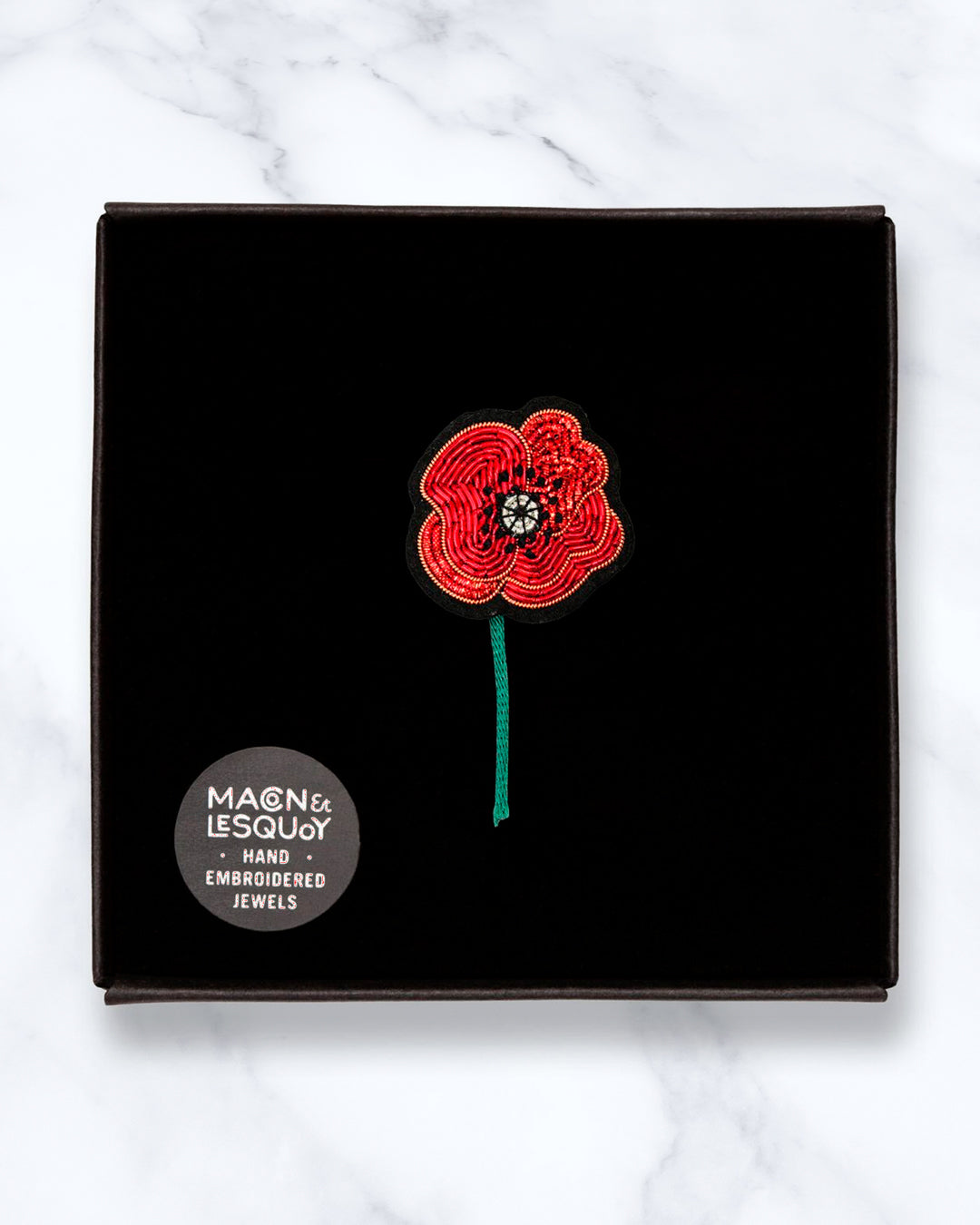 Make a statement with this beautiful Claude's Poppy hand embroidered decorative lapel pin by Paris based Macon et Lesquoy