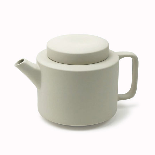 Extra large stoneware teapot from Dutch company Kinta who produce contemporary ceramics and homeware. The extra large teapot is clay grey in colour, with a soft matt exterior finish. Its design is influenced  by ceramic trends of the 1960s, but with a pleasing modern and neutral colour palette. 