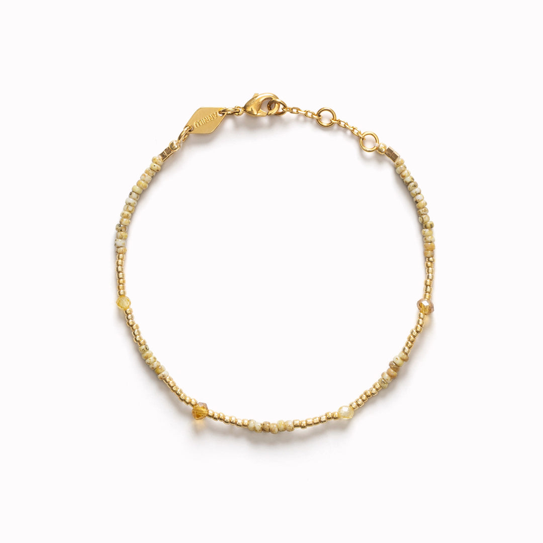 CLEMENCE in Speckle Ecru is all about quiet elegance. With its ivory-toned palette and delicate feel, it’s understated, undone, and endlessly wearable.