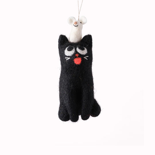 Clint the black cat is being teased by a white mouse on his head! He is a playful felted Christmas tree decoration designed by Elliot Kruszynski.