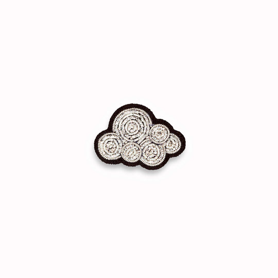 Hand-embroidered Cumulus Cloud lapel pin by Parisian fashion accessory brand Macon et Lesquoy.