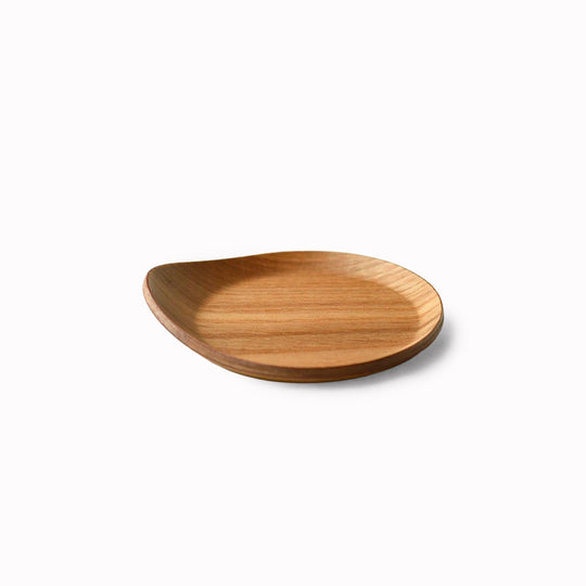 Tear drop shaped wooden coaster with bevelled edges to contain any unwanted drips.