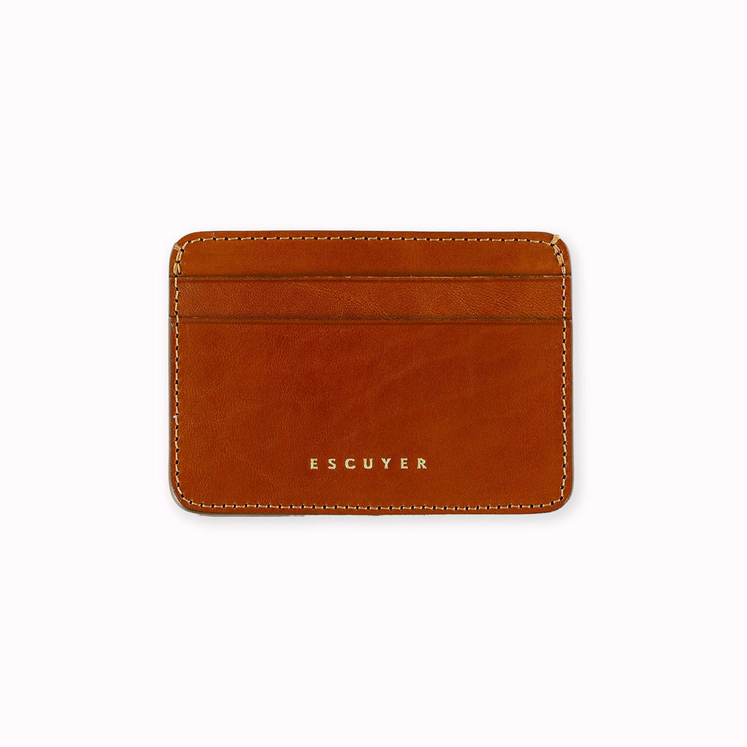 A slim and stylish cardholder from Escuyer, in Cognac brown leather. The cardholder is handmade by Portuguese artisans, using vegetable-tanned leather from a tannery in Tuscany, Italy.