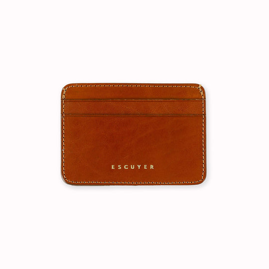 A slim and stylish cardholder from Escuyer, in Cognac brown leather. The cardholder is handmade by Portuguese artisans, using vegetable-tanned leather from a tannery in Tuscany, Italy.