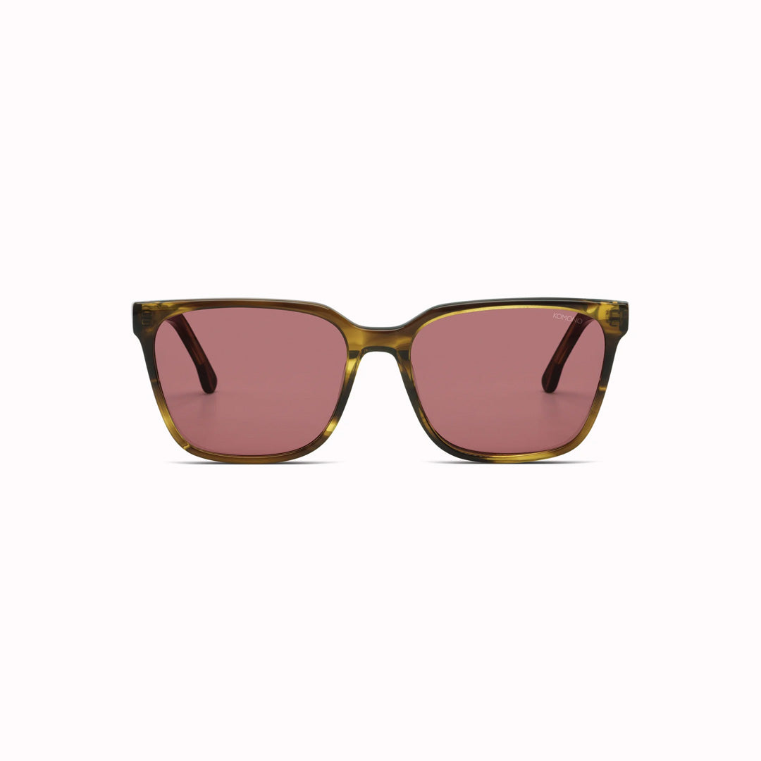 Strong lines, elegant and fine. The Cole sunglesses from Komono make sure to bring out your best features with their fine acetate frame.  Desert Dust is a golden-brown frame colour, which looks really striking with the solid burgundy lenses. 
