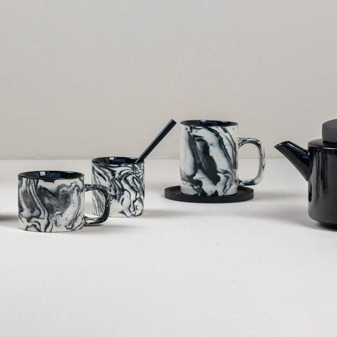 Collection of CYL Black & White marbled gloss glaze mug from Dutch company Kinta