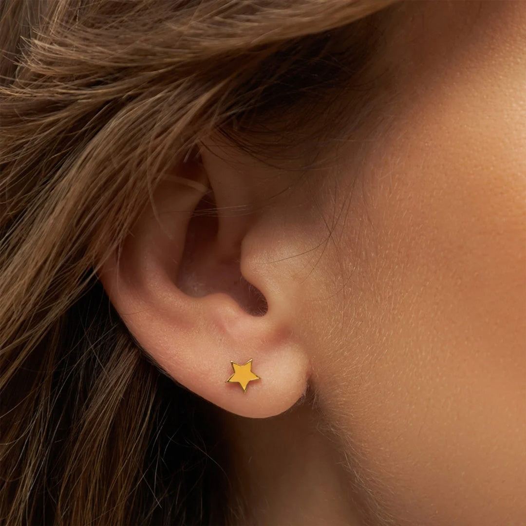 LULU Copenhagen's gold-plated Colour Star earring. As Worn Detail.